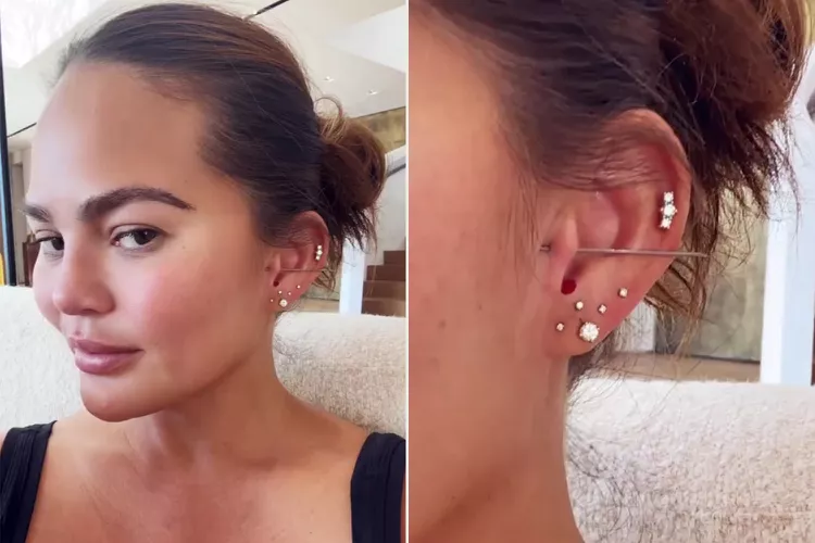 Chrissy Teigen Shares Image of Her Having New Tragus Ear Piercing — Complete with Needle