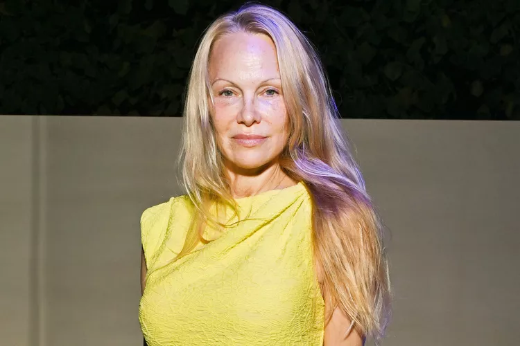Pamela Anderson Radiates in Chic Yellow Dress During Paris Fashion Week — See the Look!