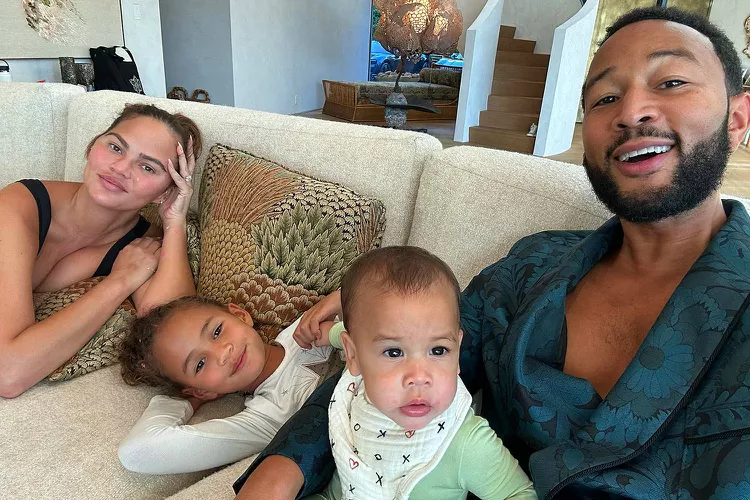 John Legend Snuggles Up with Chrissy Teigen and His Two Daughters in New Photo: 'Me and My Girls'